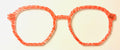 Rowan Topper; red/orange geometric pattern