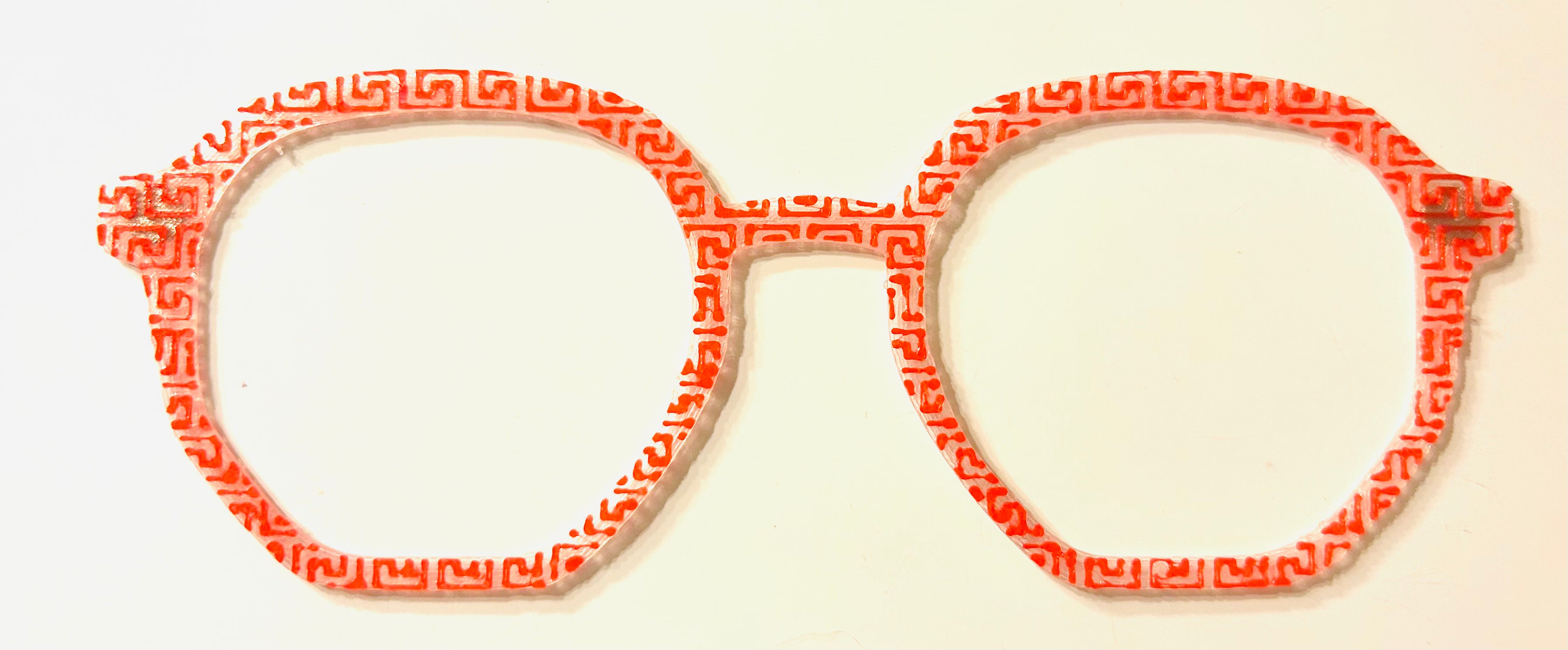 Rowan Topper; red/orange geometric pattern