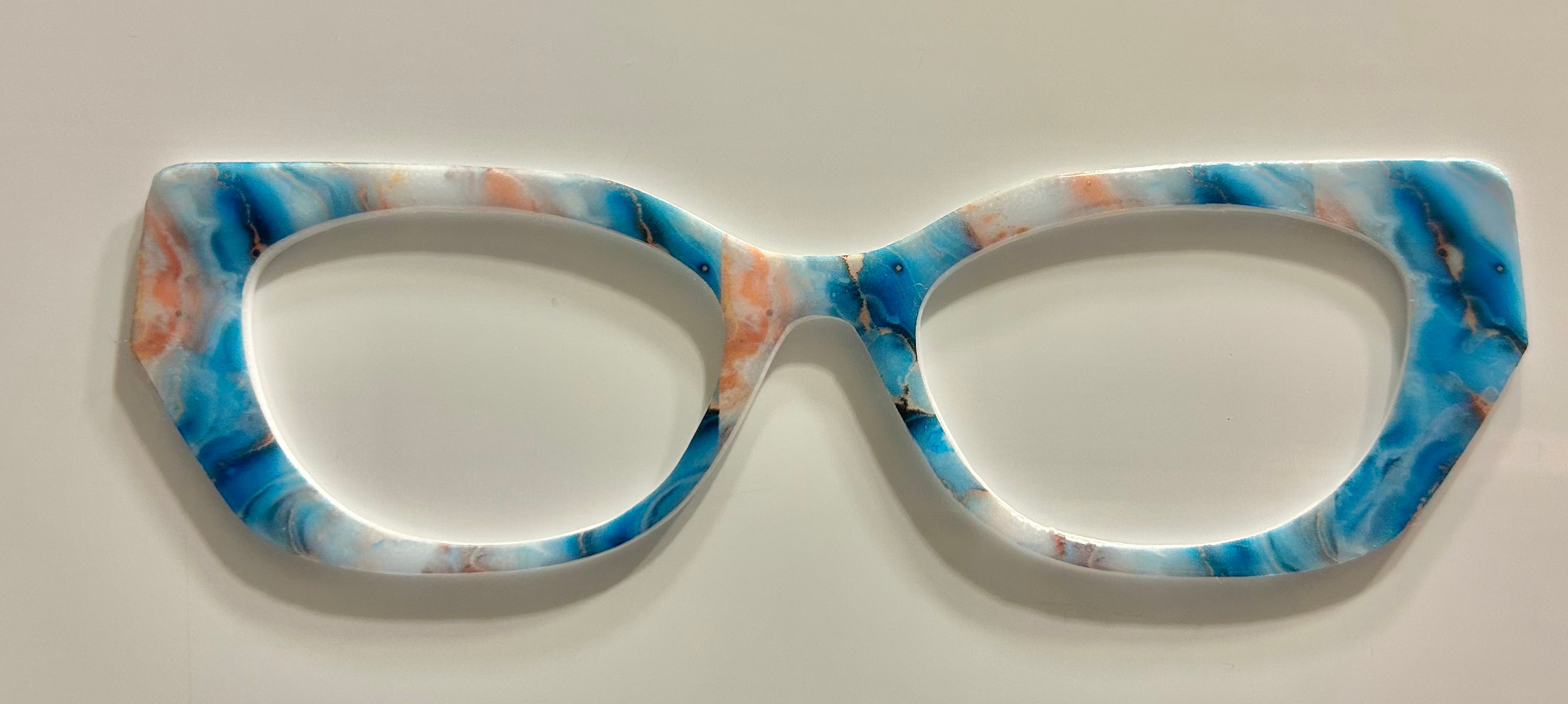 Ella Topper; Creator; peach, blue, and white marble pattern