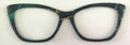 Wanda Topper; green and black with gold streaks