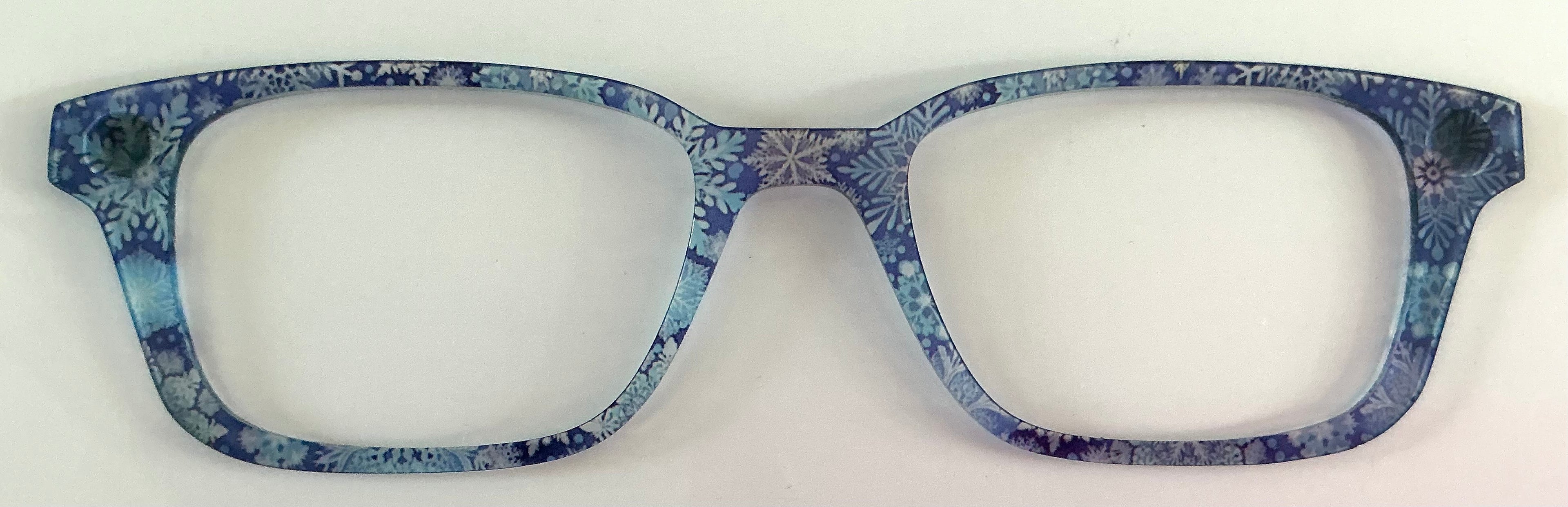Finley Topper; Laser Nonna; translucent blue snowflakes