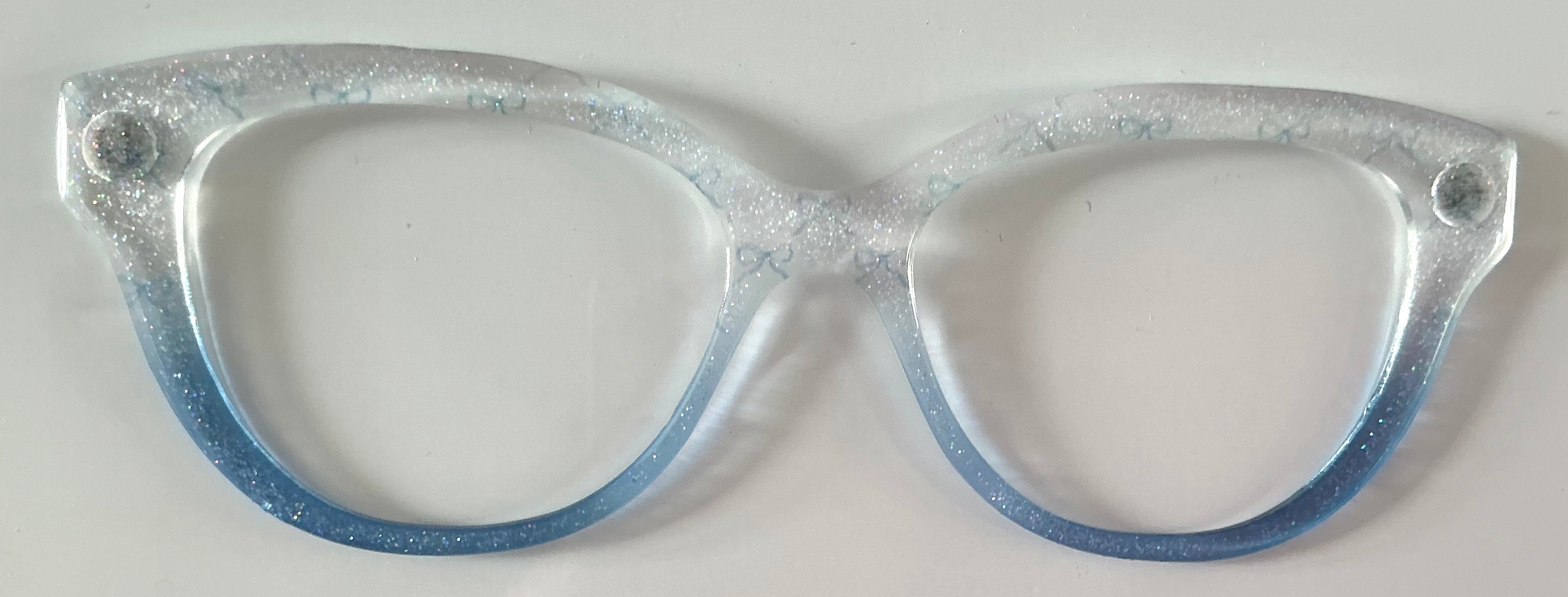 Quinn Topper; clear/blue fade shimmer with ribbons
