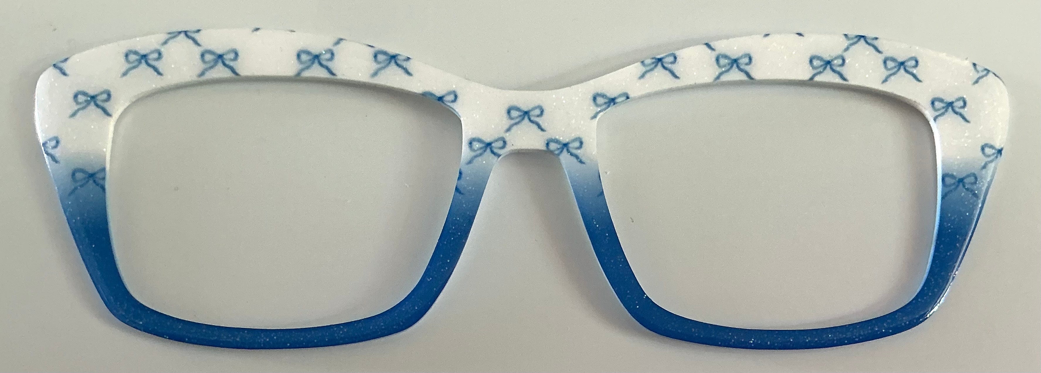 Kirella Topper; RESINED; white and blue bow glitter fade