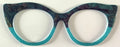 Zuri Topper; Creator; dark tones teal design/aqua shimmer split