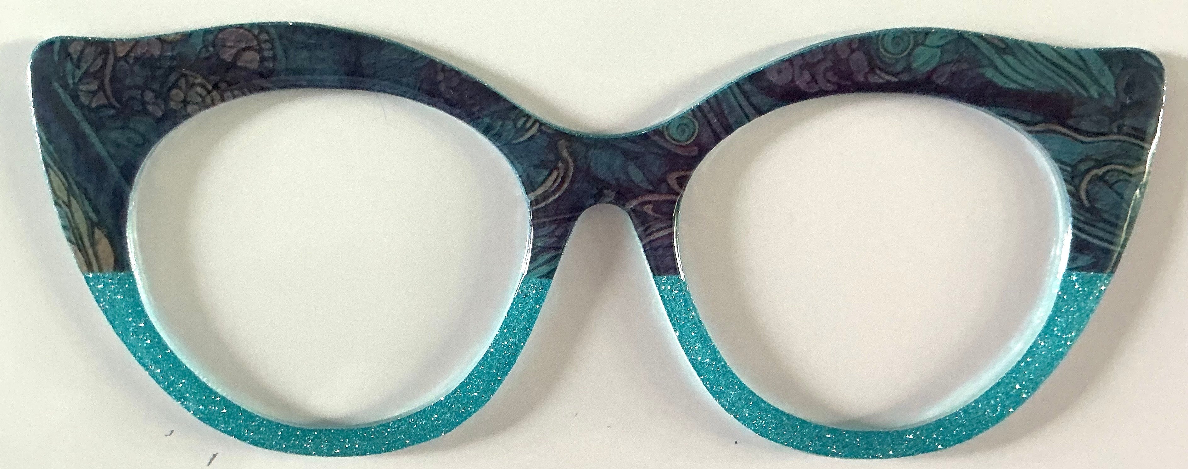 Zuri Topper; Creator; dark tones teal design/aqua shimmer split