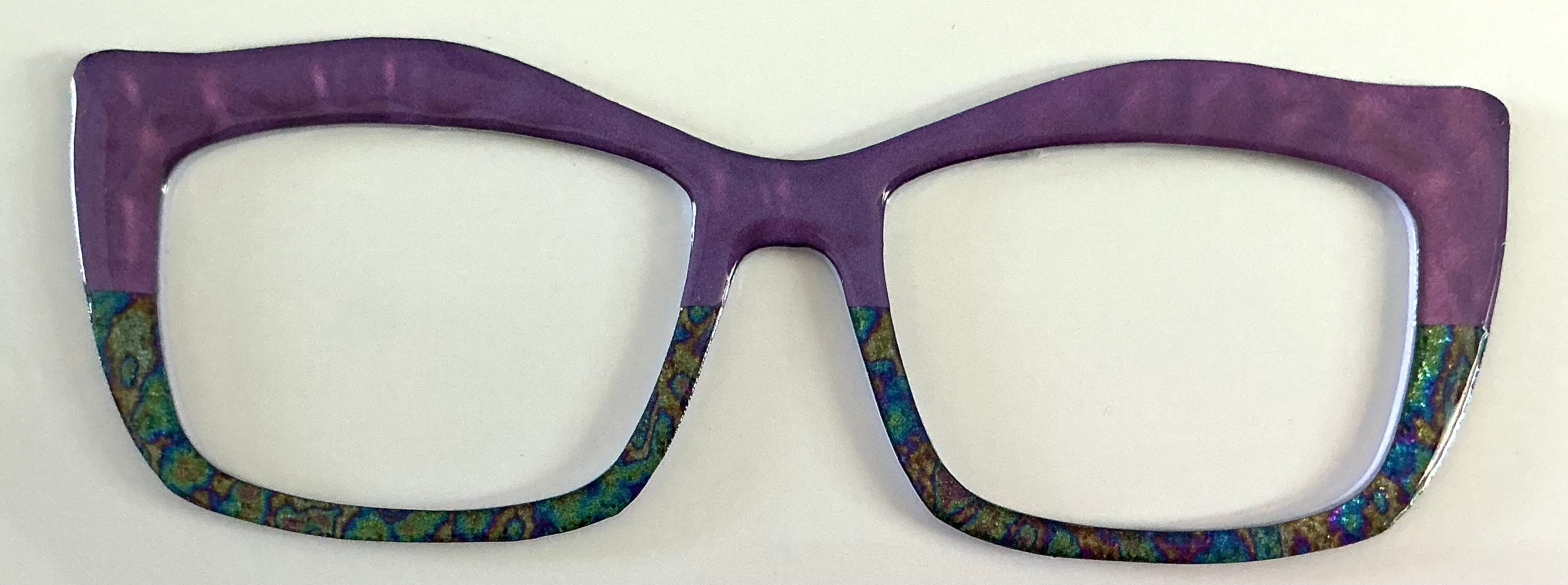 Kirby Topper; Creator; purple/blue green design split