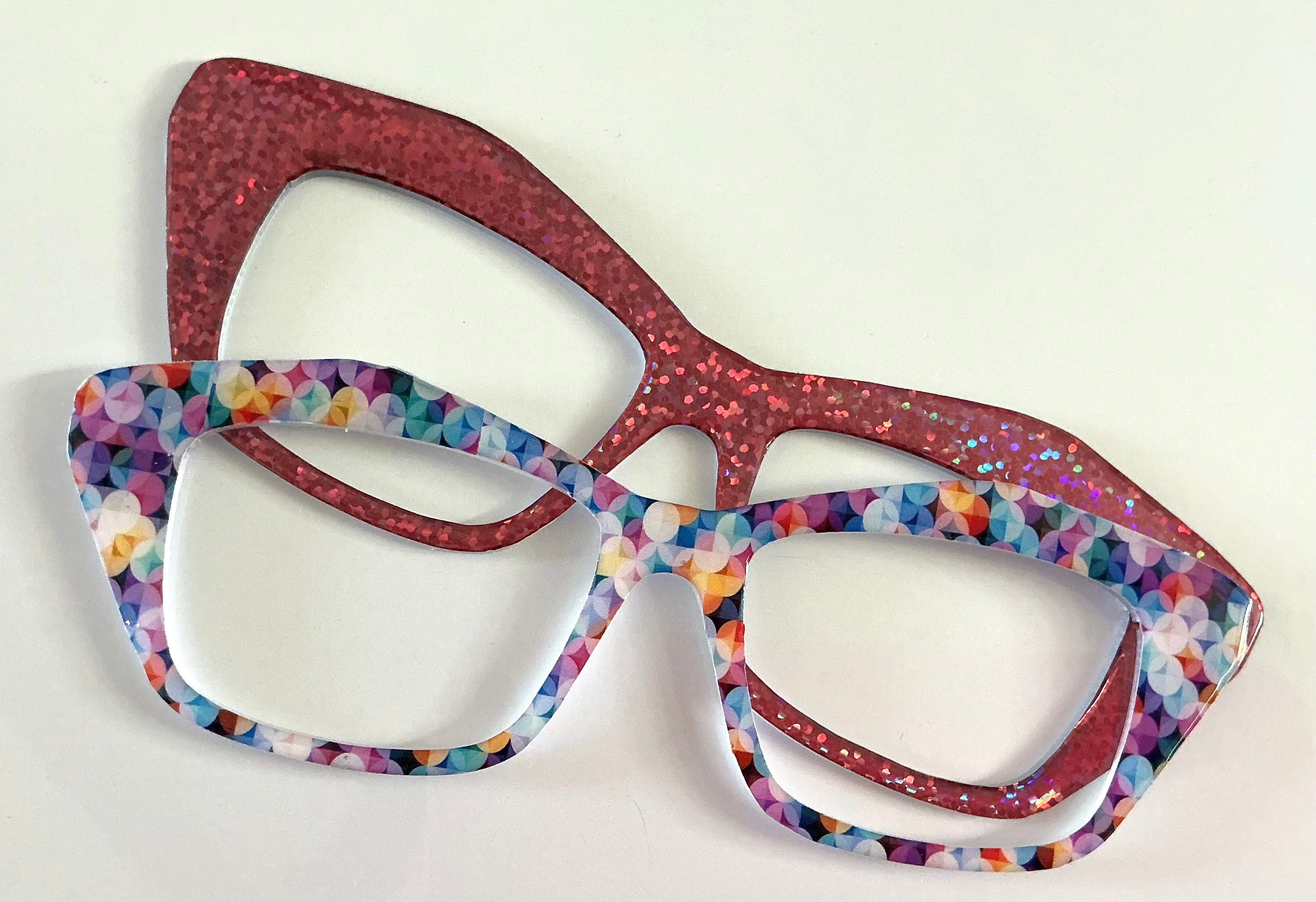 Kirby Topper; hybrid stackers; multicolored circular pattern on pinkish purple; **sold as set