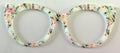 Zuri Topper;Creator; pink and white flowers in light green