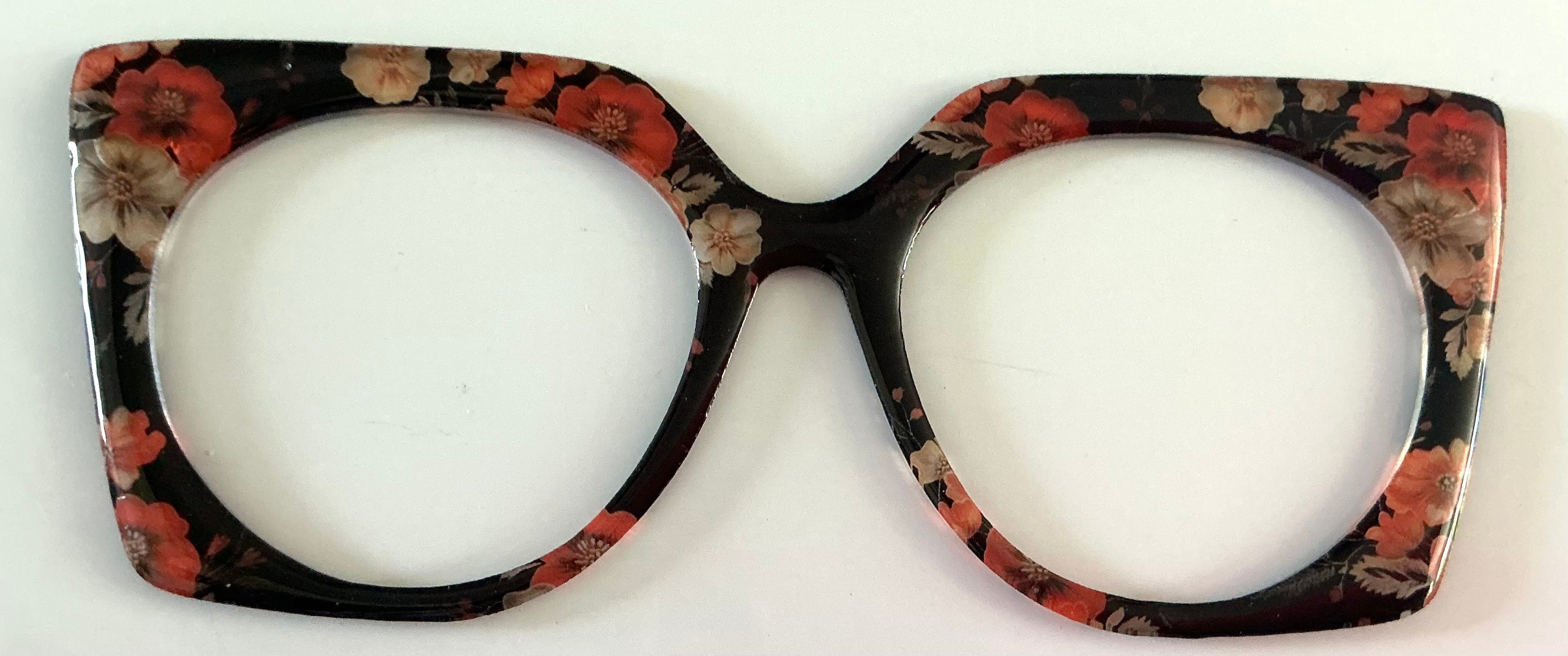 Zuri Topper;hybrid; red and tan flowers on black shine