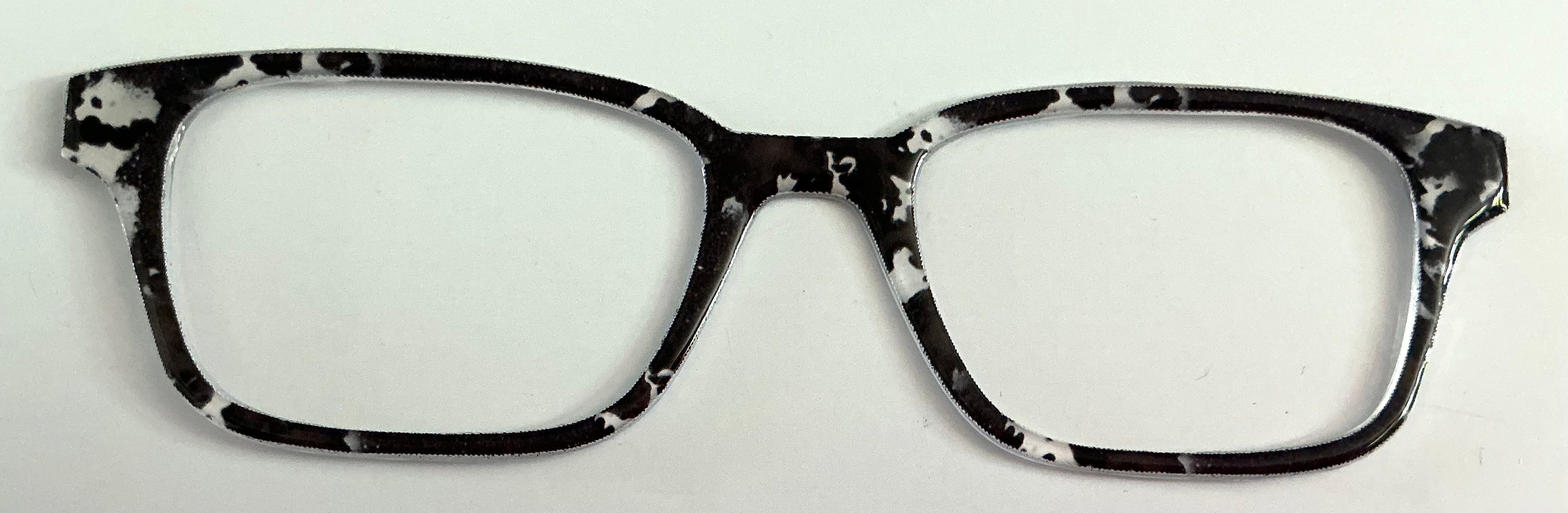 Finley Topper; brown and white cow print