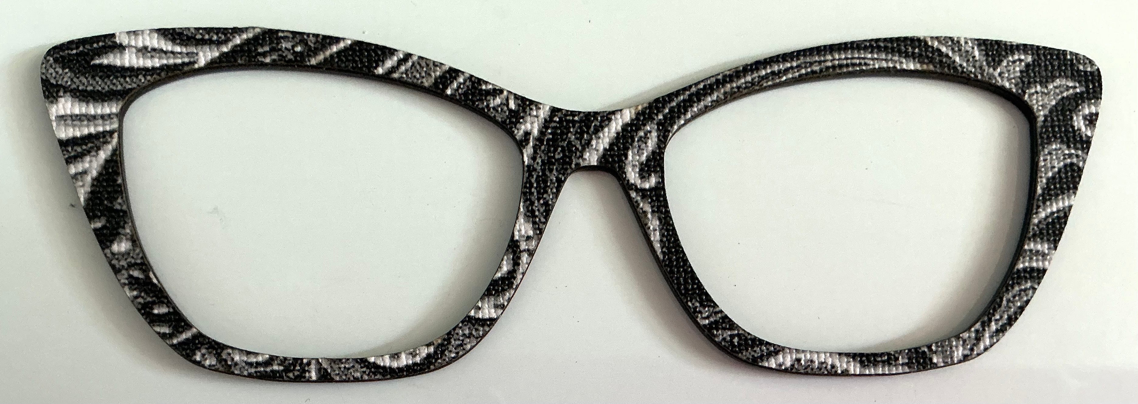 Wanda Topper; Laser Nonna; textured; silver swirls on black