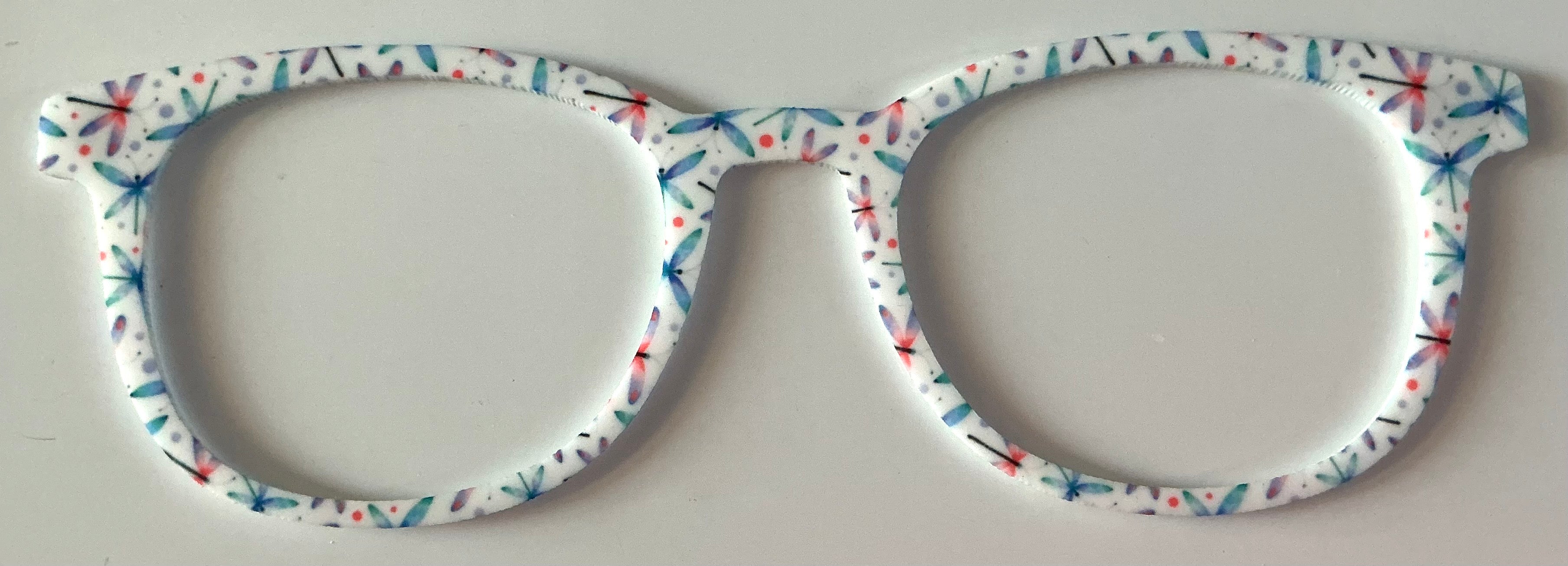 Reese Topper; dragonflies on white