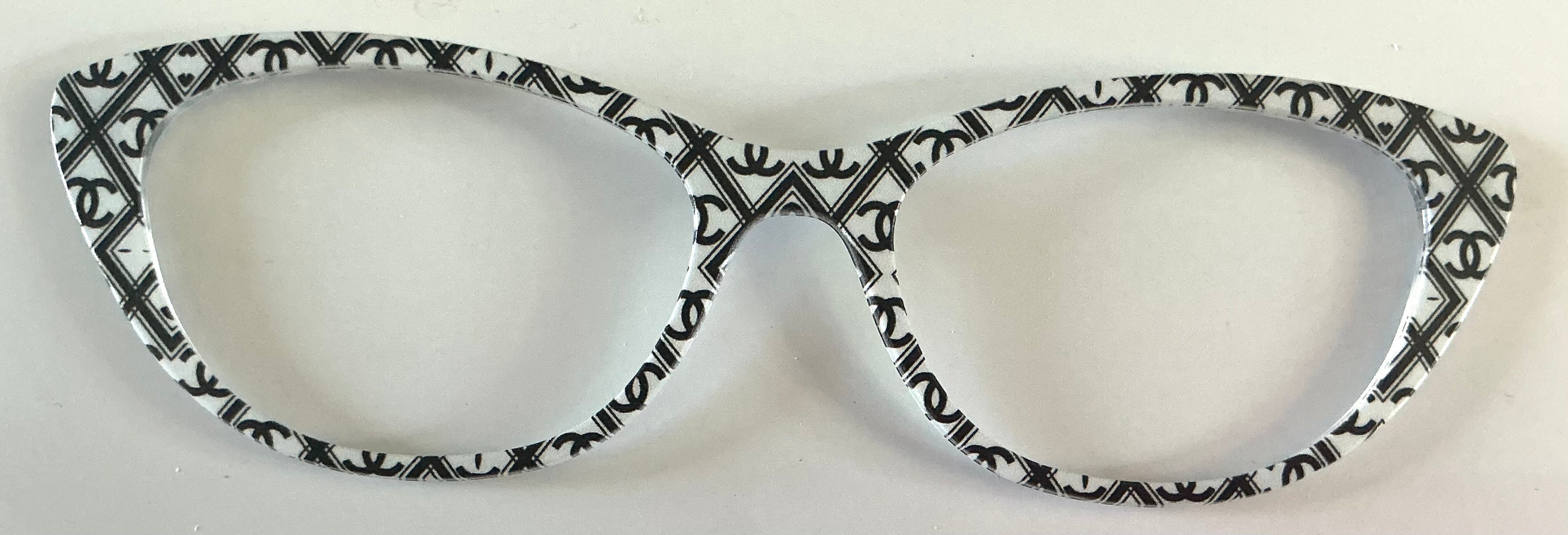 Ella Topper; black Chanel design