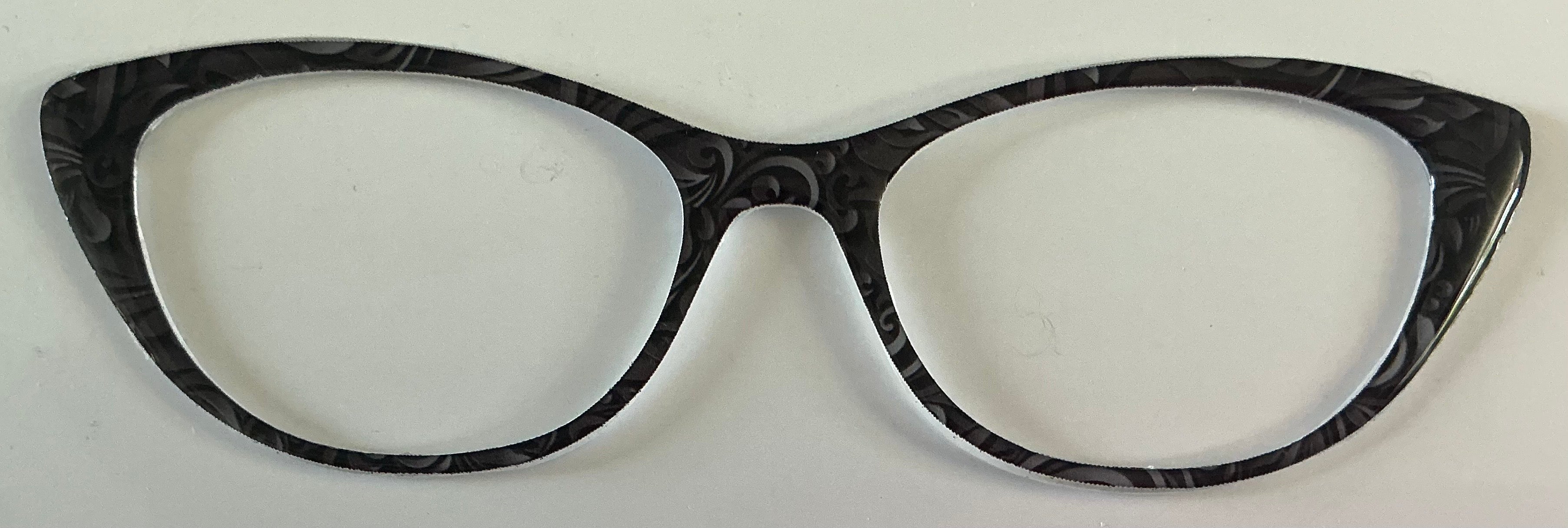 Ella Topper; black swirls