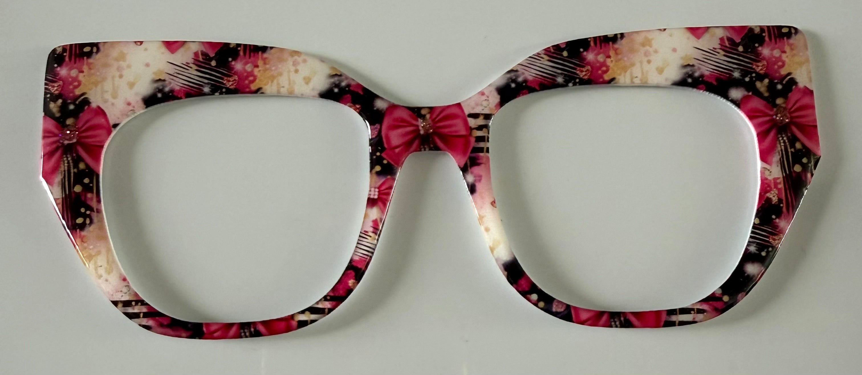 Murphy Topper; hybrid; Melissa’s Magnetic Marvels; pink/cream/black flowers and bows