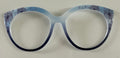PAIR Zuri Topper; blue gradient with dandelions in corners