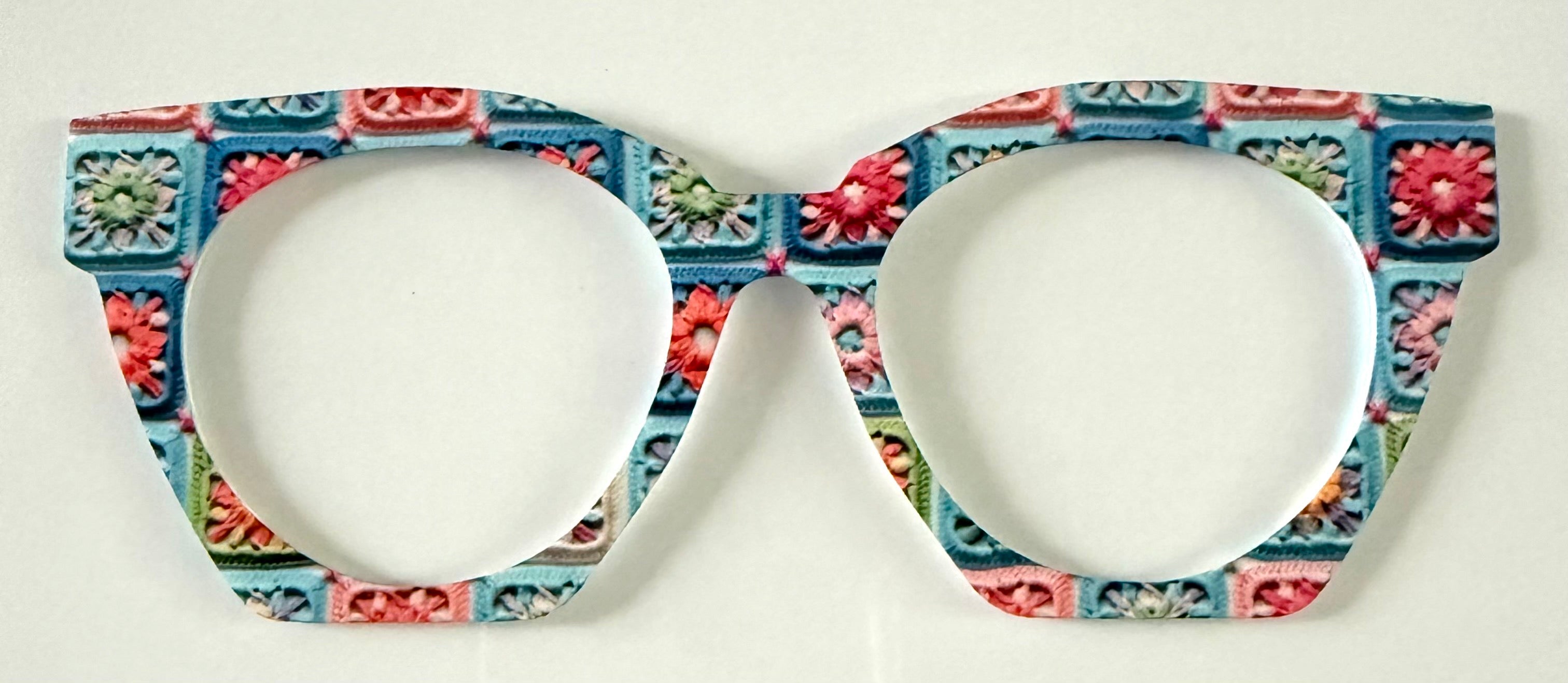 Zuri Case Topper; multicolored geometric pattern with flowers