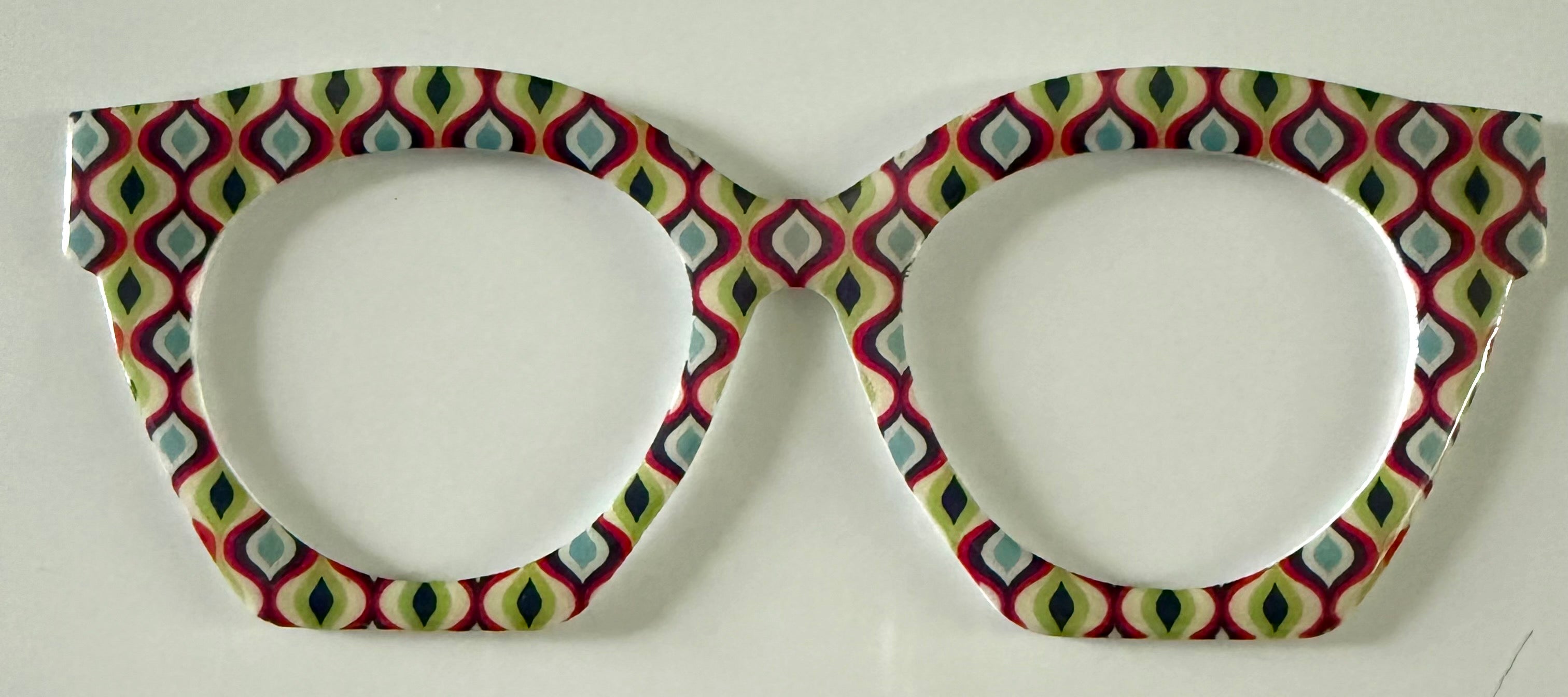 Zuri Case Topper; multicolored geometric pattern