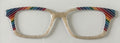 Finley Topper; cream with rainbow diagonal corner stripes