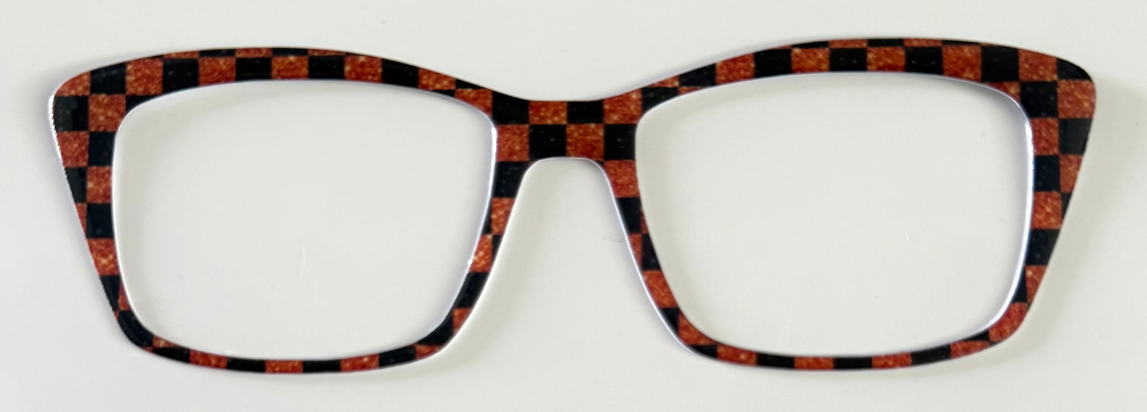 Kirby Topper; hybrid; orange glitter print and black checkered