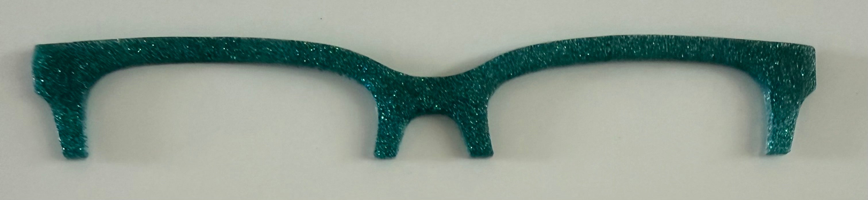 Larkin Brow Topper; green glitter