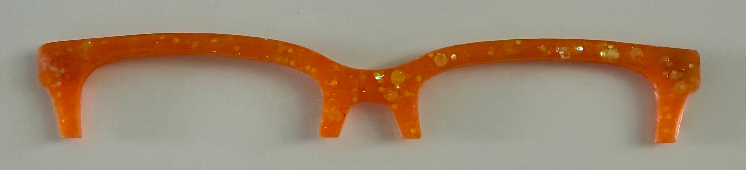 Larkin Brow Topper; orange glitter
