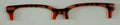 Larkin Brow Topper; orange and black plaid