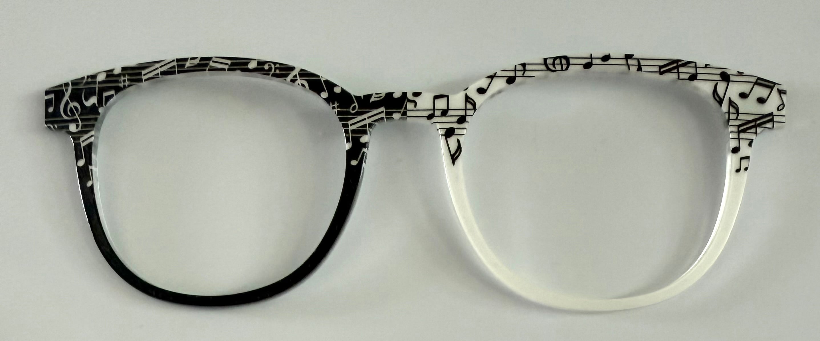 PAIR Reese Topper; black and white music notes on staff