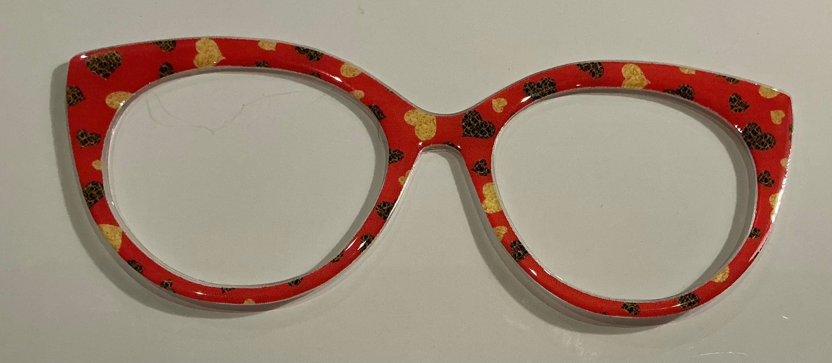 Zuri Topper, Busy Bee, gold and black stars on red