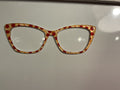 Wanda, red dots on cream
