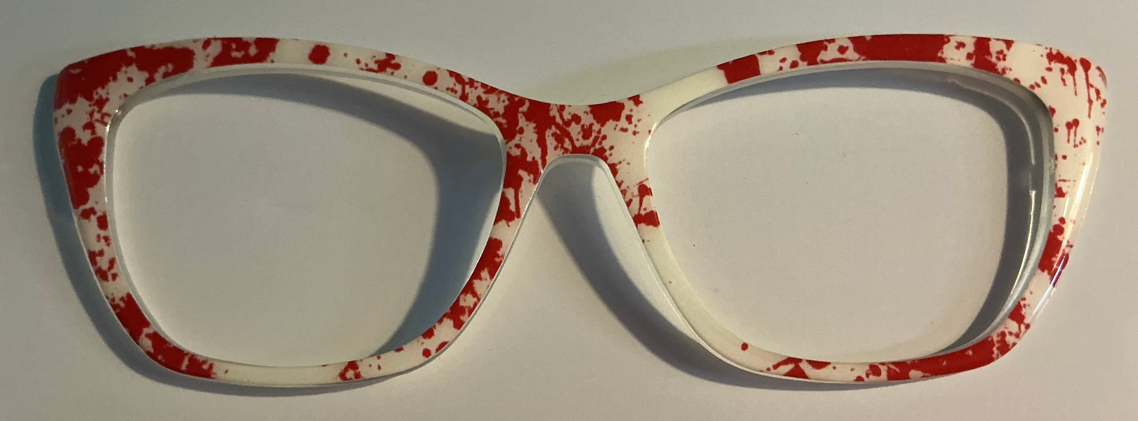 Wanda Topper; wide spread blood splatter