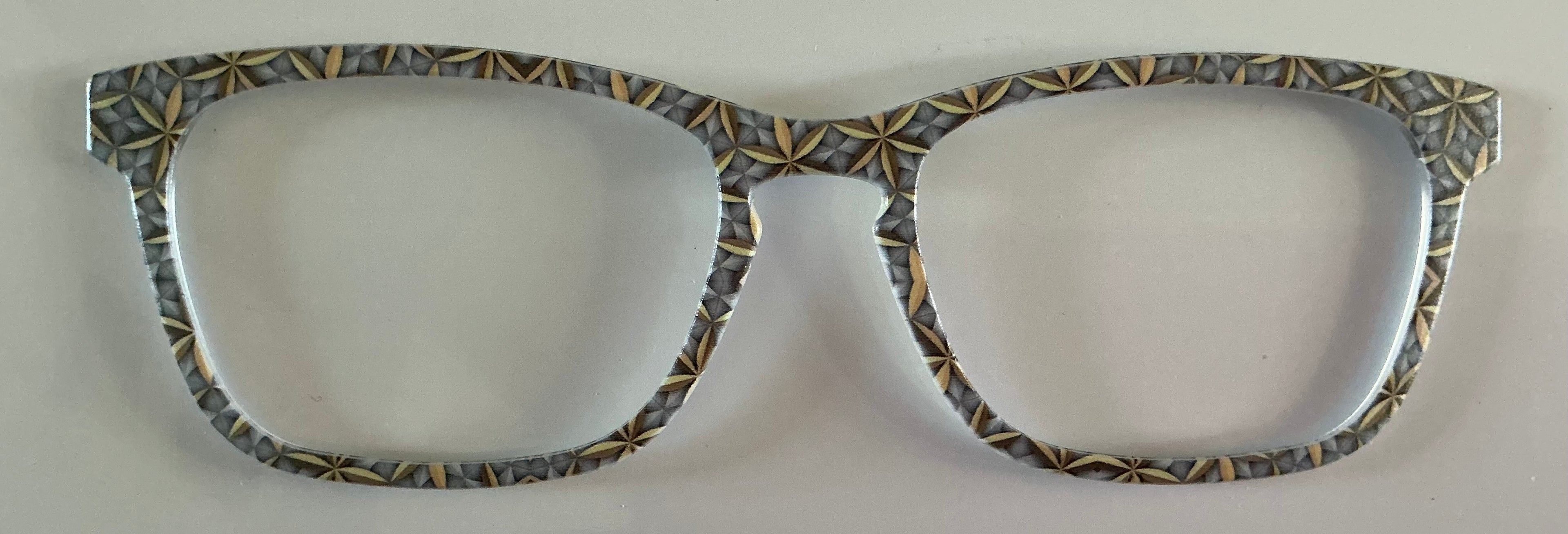 Casper Topper; gray and gold geometric pattern