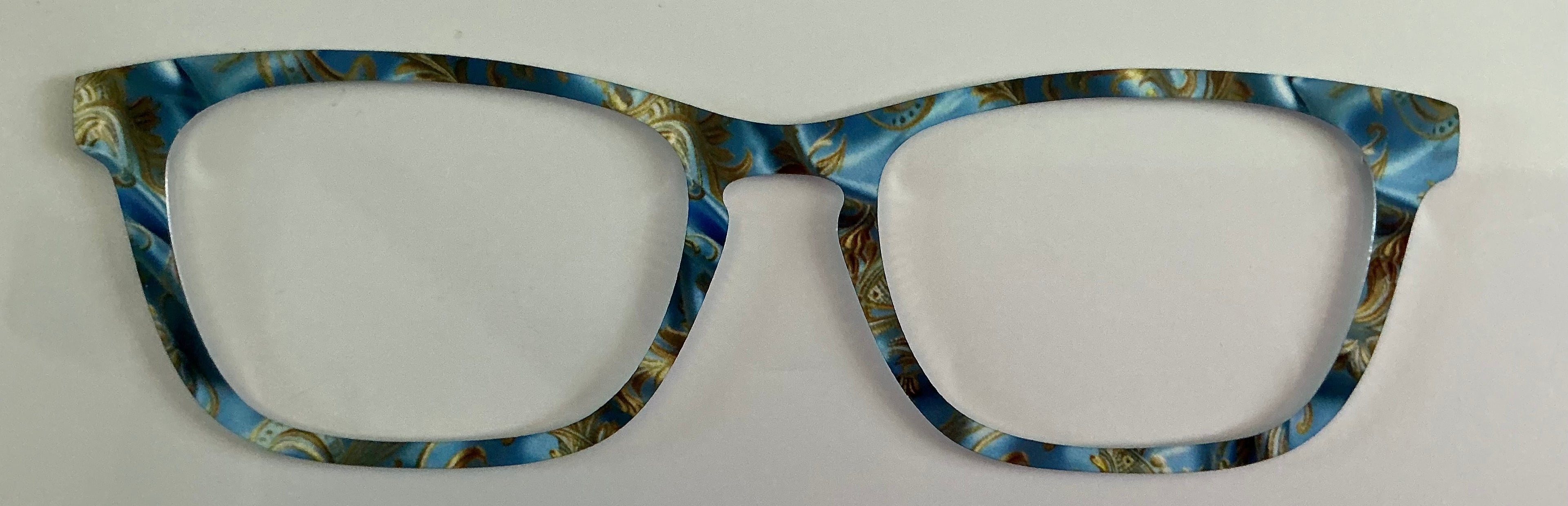 Casper Topper; metal; ornate gold design on blue