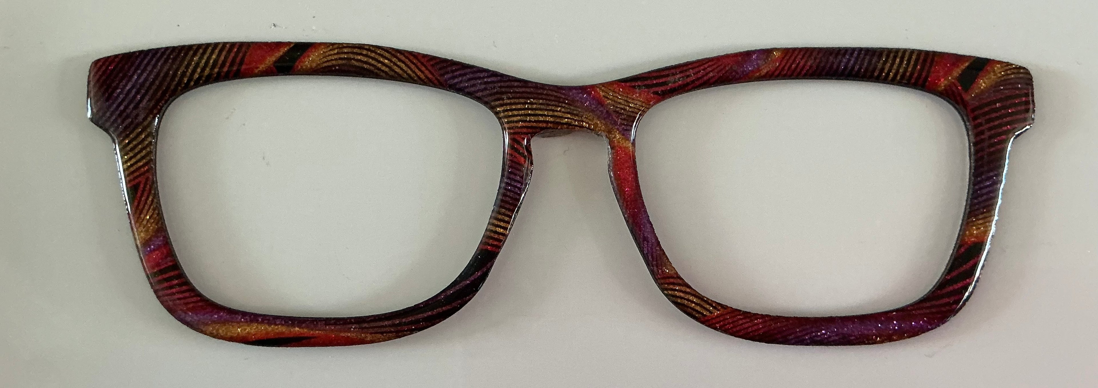 Casper Topper; Laser Nonna; gold and red and black lines with resin
