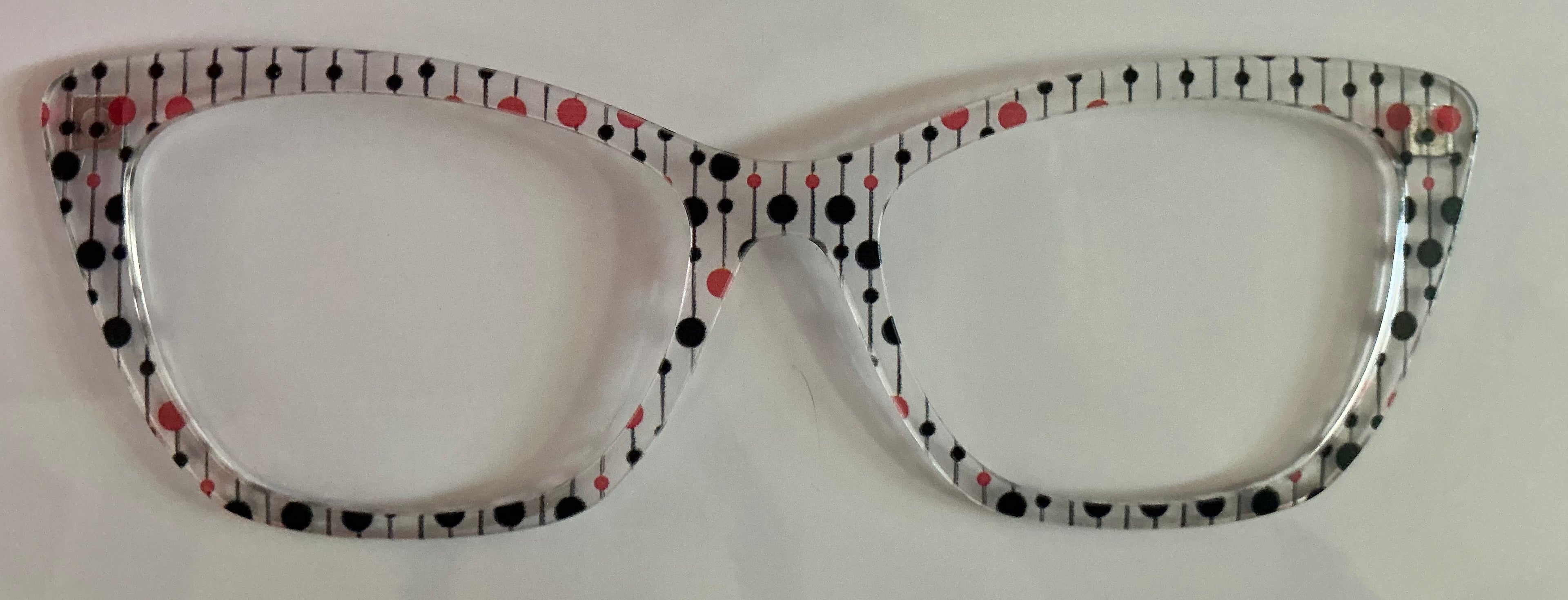 Wanda Topper; translucent black and orange dots