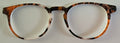 Soto Topper; orange,brown, and white animal print
