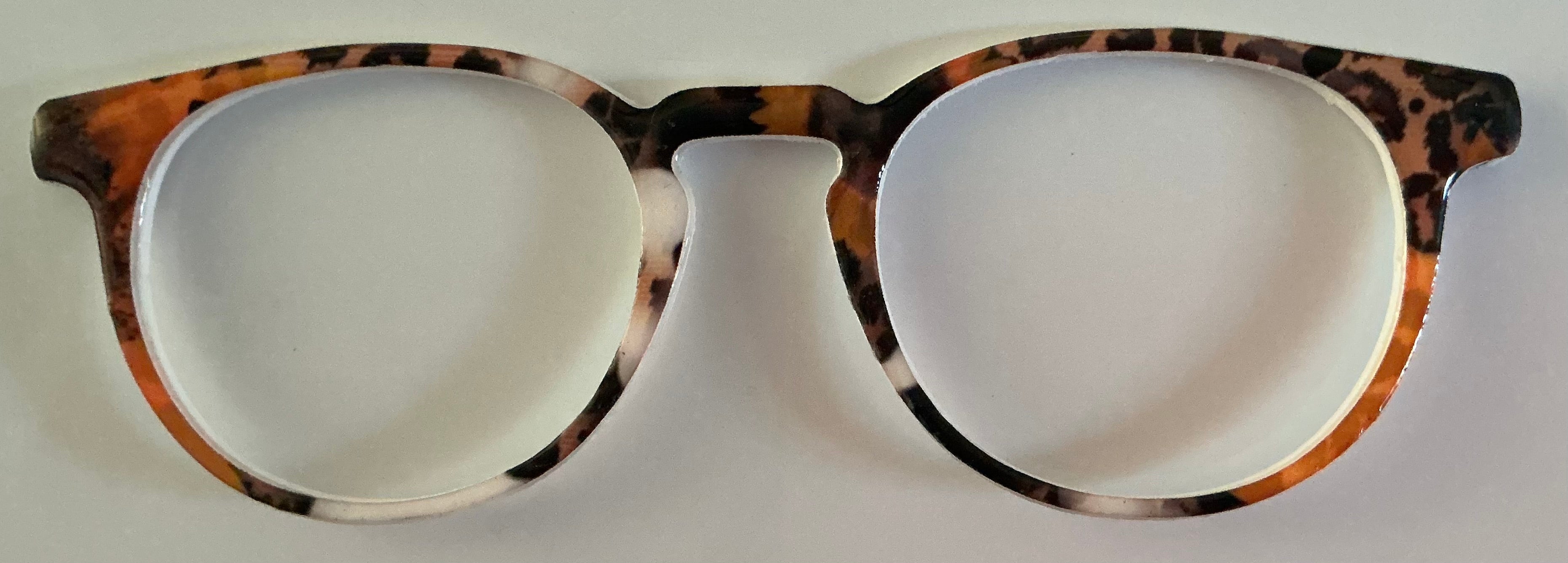 Soto Topper; orange,brown, and white animal print