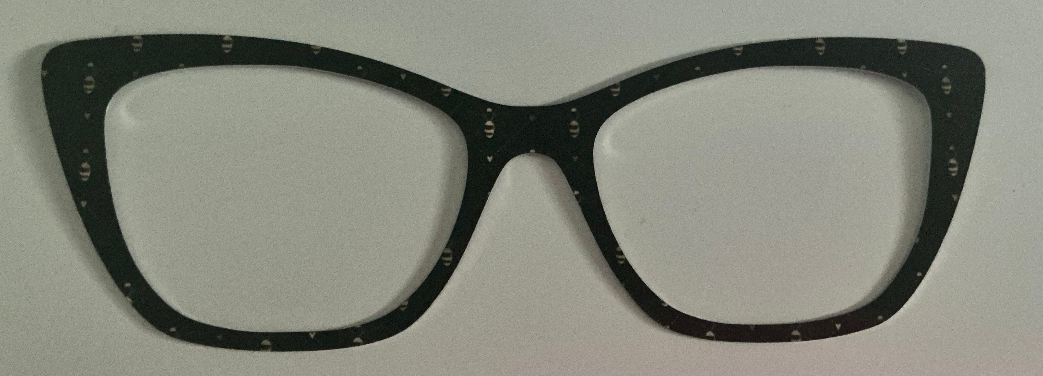 Wanda Topper; metal; black with bees