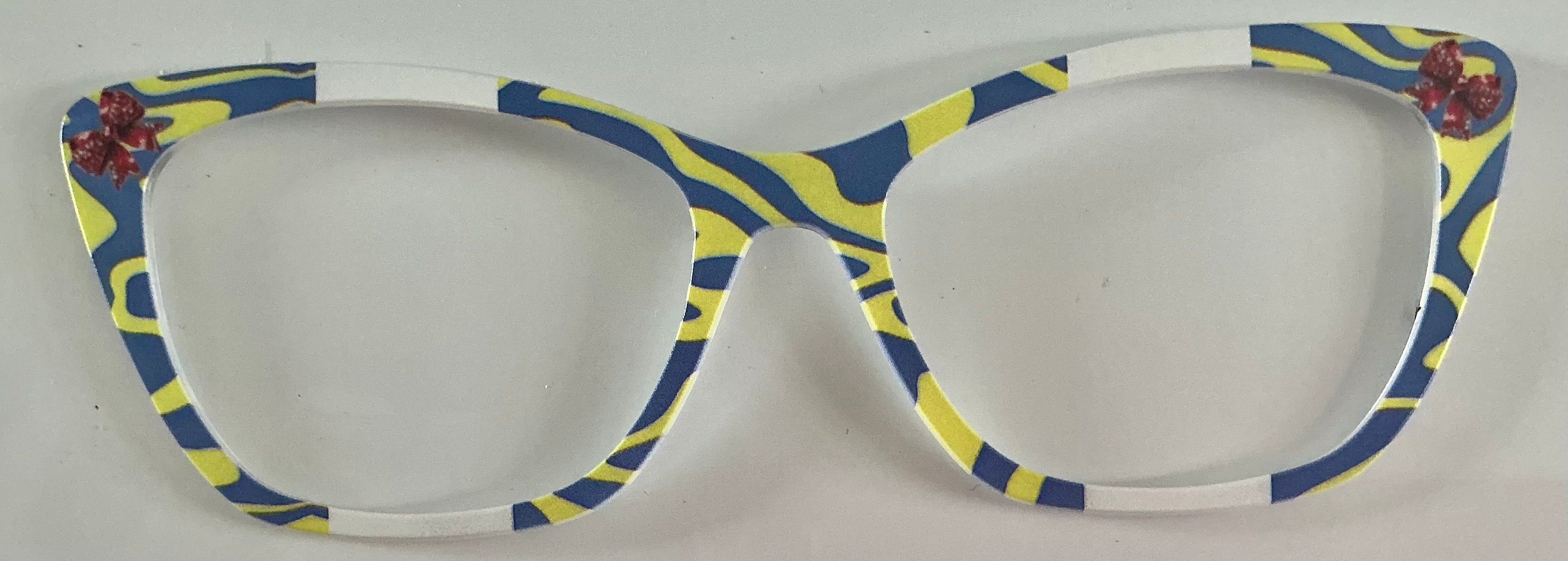Wanda, blue yellow white swirls with red ribbon corners