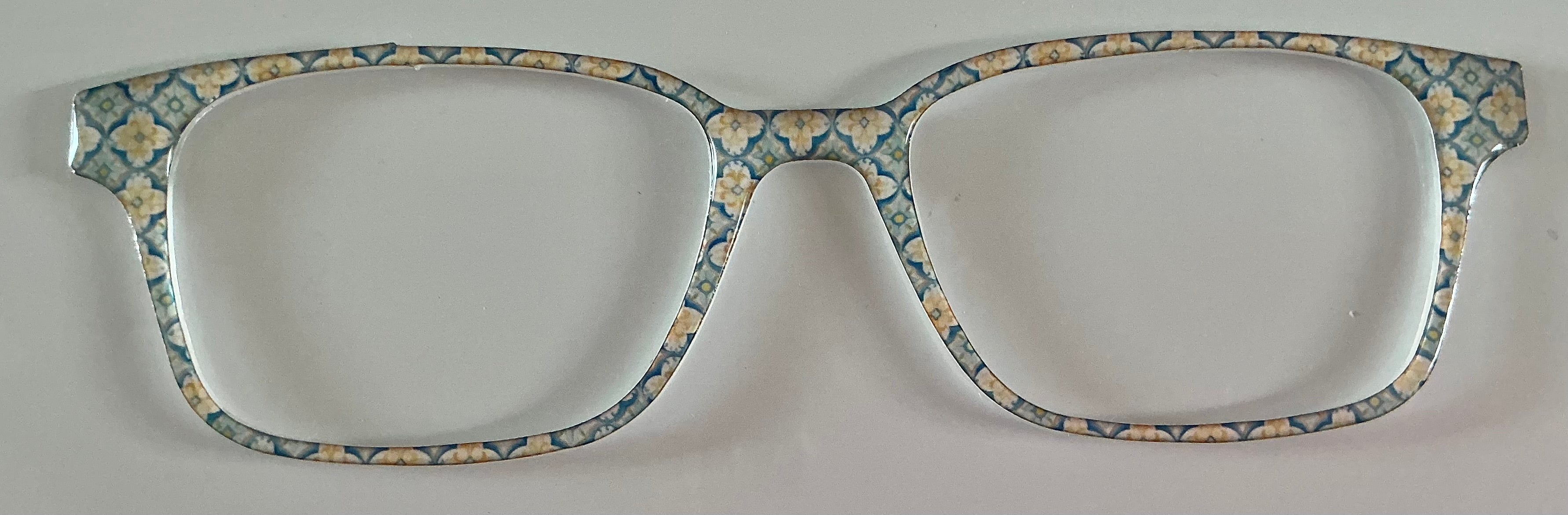 Finley Topper; blue and gold geometric design