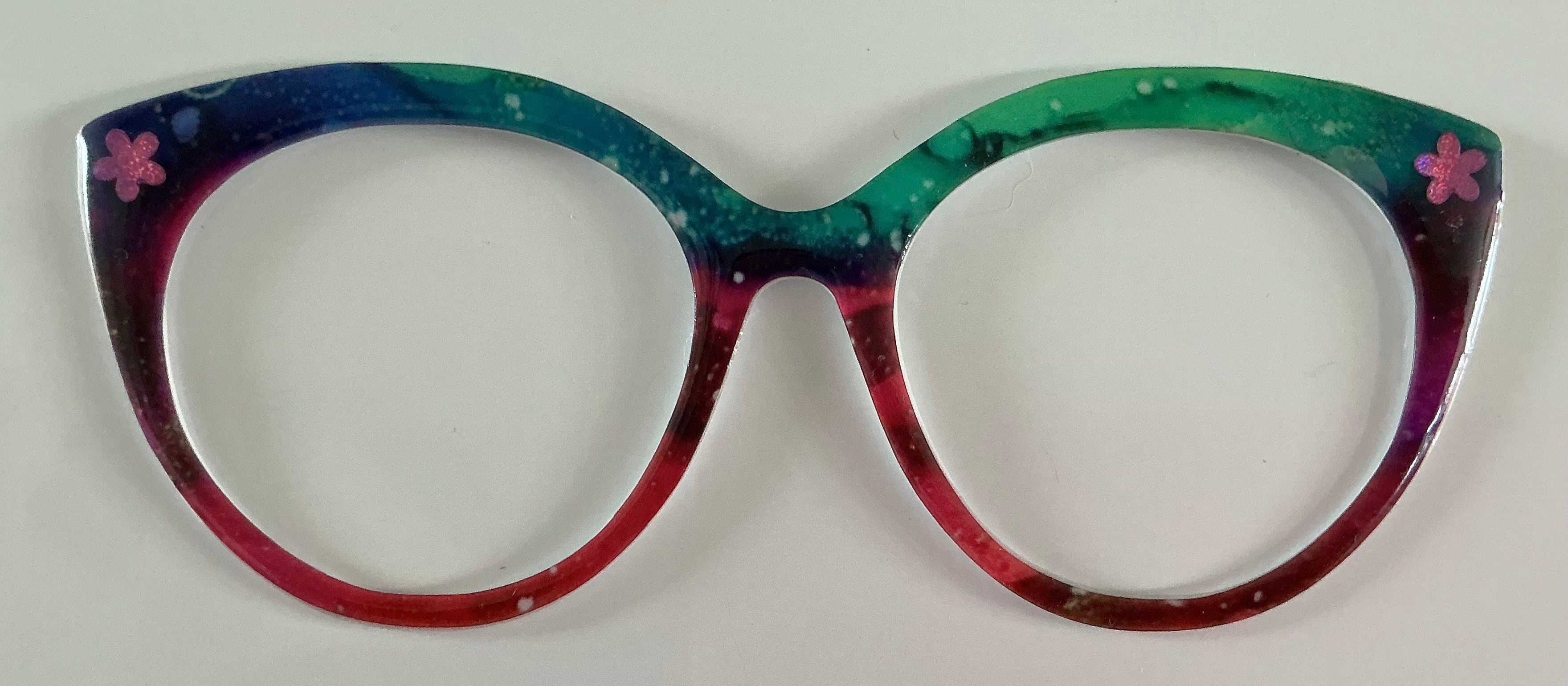 Zuri Topper; vibrant multicolored with pink flowers in corners